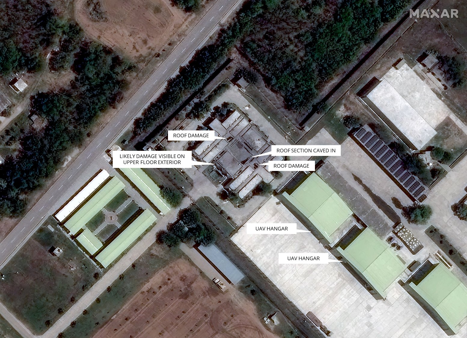 Post-strike image from May 10 shows damage to the roof of the structure, which is located adjacent to two UAV hangars. With inputs: Damien Symon