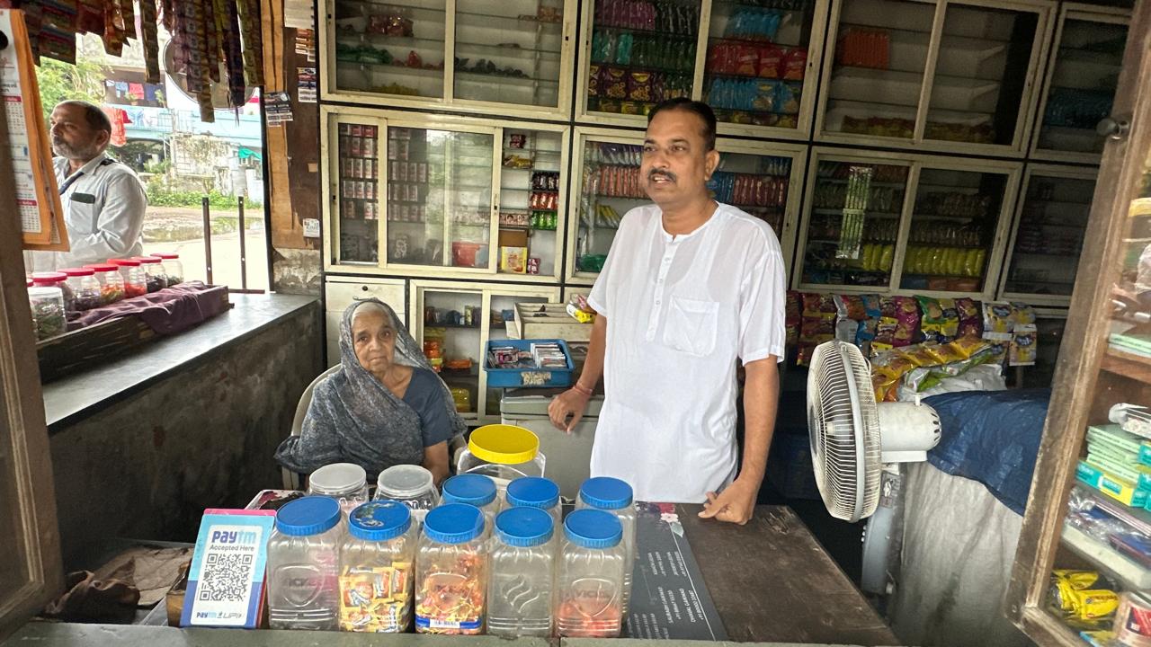 Vikram Singh Parmar with his mother at their grocery shop, near Ahmedabad airport. Vikram Singh Parmar with his mother at their grocery shop, near Ahmedabad airport.