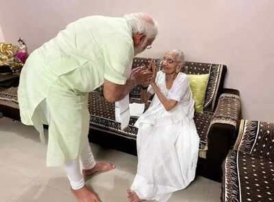 PM Modi and his mother Heeraben Modi (File photo) 'Congress has sworn to insult her': BJP on AI video of PM Modi's mother; blames Rahul Gandhi's 'arrogance'