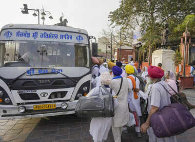 Amritsar: Sikh pilgrims board a bus to leave for Pakistan to celebrate the Baisakhi festival, in Amritsar. (PTI Photo/Shiva Sharma) Govt allows Sikh pilgrims to visit Pakistan for Prakash Purab; selected 'jathas' to travel - report