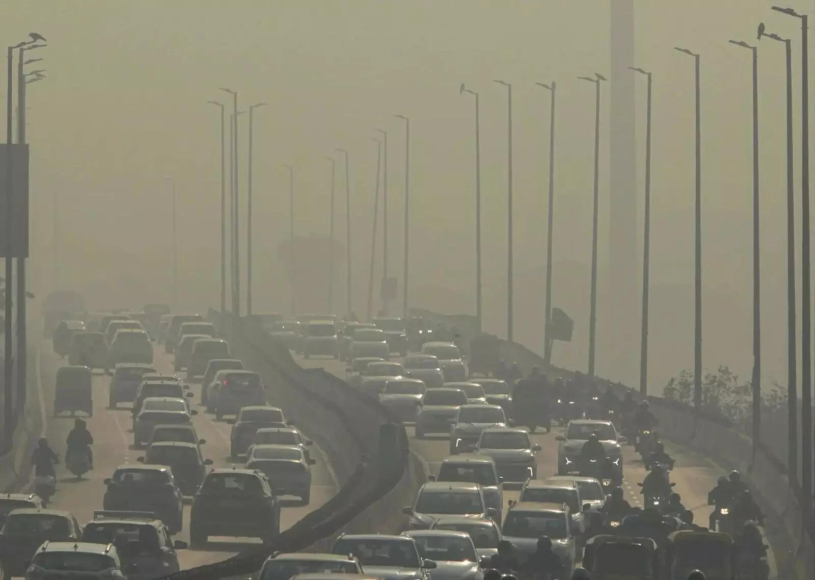 Barapullah flyover on a smoggy winter morning (PTI)