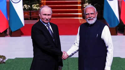 <p>PM Modi with Putin</p> As world watches, Modi flags peace in tough balancing act