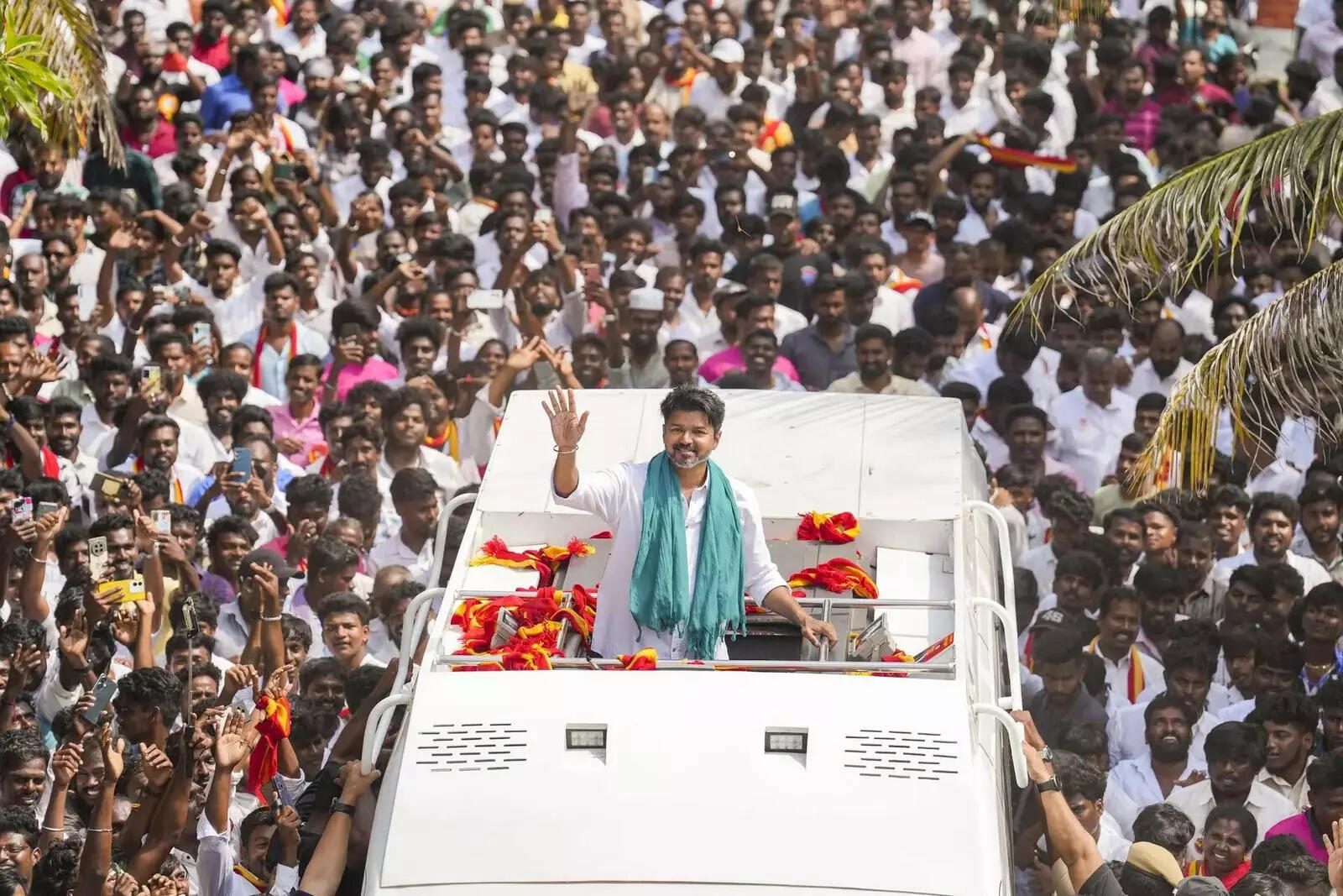 Kanchipuram_ Tamilaga Vettri Kazhagam (TVK) chief and actor Vijay waves as he me....
