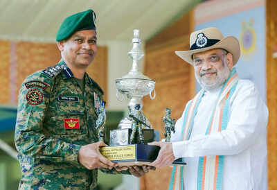 Amit Shah and CRPF personnel during the felicitation ceremony at the 87th CRPF Raising Day Parade, in Guwahati on Saturday. (ANI Photo) BJP will deport infiltrators in 5 yrs if it returns to power: Amit Shah