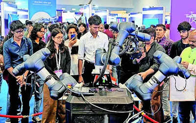 Visitors explore cutting-edge AI gizmos at the summit on Wednesday People must be careful of risks while developing technologies: AI expert