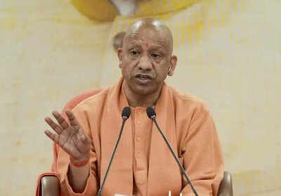 UP CM Yogi Adityanath (PTI photo) Should cops just face bullets and not fire back, asks UP CM Yogi Adityanath
