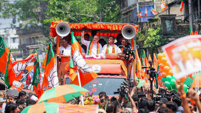 West Bengal polls: EC suspends 4 police officers after TMC workers gatecrash Amit Shah’s Bhabanipur roadshow