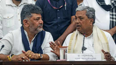PTI photo Karnataka 'nataka' enters a new phase? Siddaramaiah, DK Shivakumar meets top brass; cabinet berths on radar