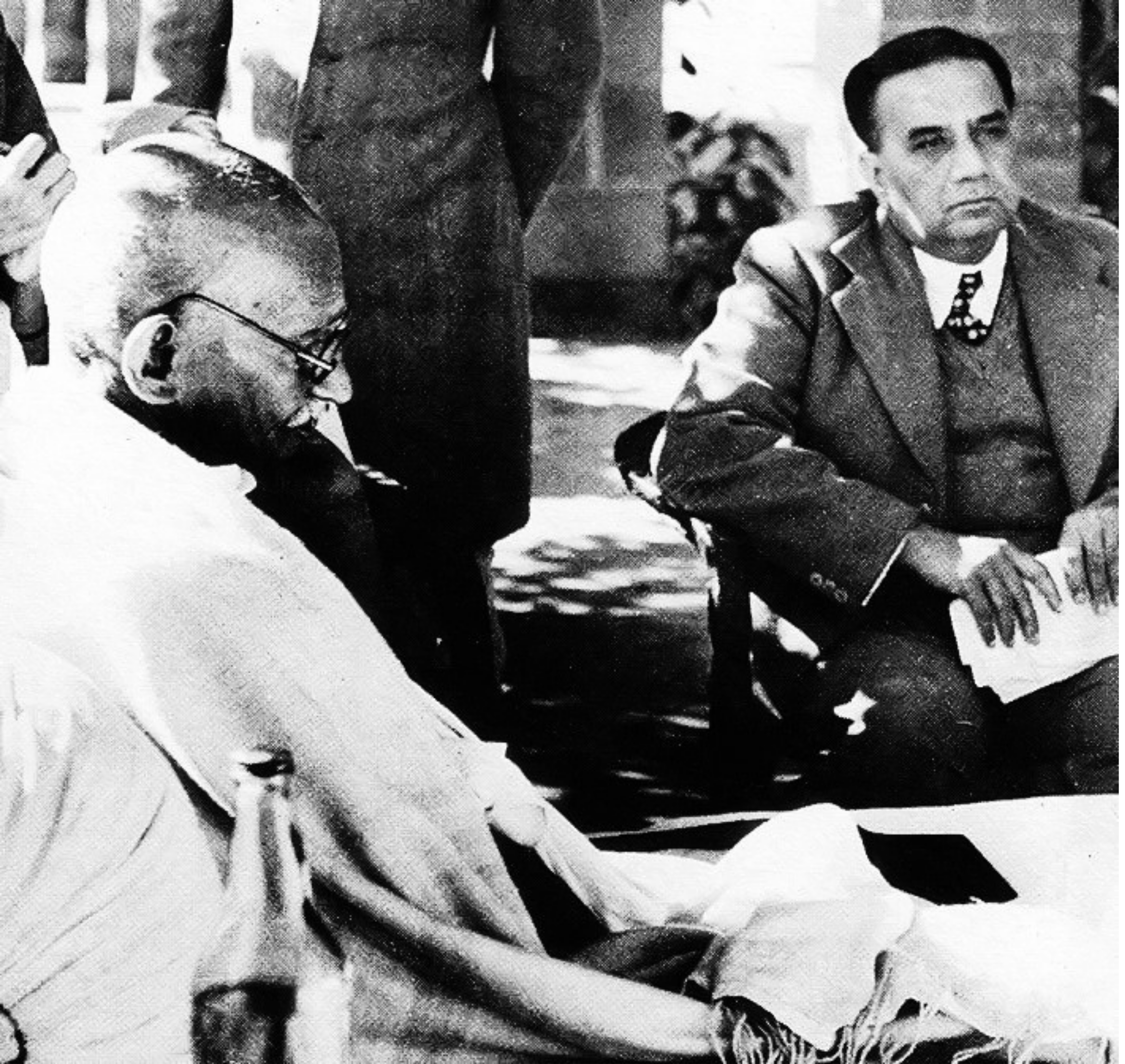 Huseyn Suhrawardy (right) with MK Gandhi. The two worked to contain communal violence ahead of Independence (Image_ Wikipedia).