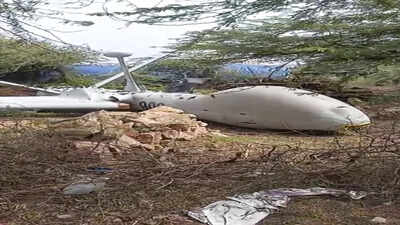 Porbandar: An unmanned aerial vehicle (UAV) of the Indian Navy crashed into an open field at Dharampur village during a training sortie shortly after taking off from an air enclave, near Porbandar, Gujarat. (PTI Photo) UAV crashes during training sortie near Porbandar; no loss of life: Navy