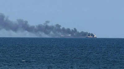Smoke rises from a vessel on fire, amid Russia's attack on Ukraine in Odesa. 4 Indians killed, 1 critically injured after cargo ship attacked off Ukraine's Odesa coast