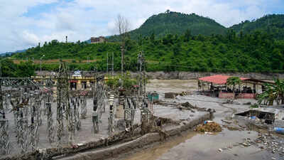 An electrical equipment at a power plant is partially buried in slush brought in by the Trishuli river in flash floods, in Dhading District, Nepal, Sunday, Aug. 30, 2026. (AP Photo) Nepal seeks to advance electricity import arrangement due to floods