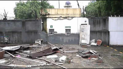 Debris lies scattered after authorities removed structures and queue-management barriers erected outside of the Pakistan High Commission, in New Delhi. 'Proportionate response': MEA on bulldozer action outside Pakistan high commission