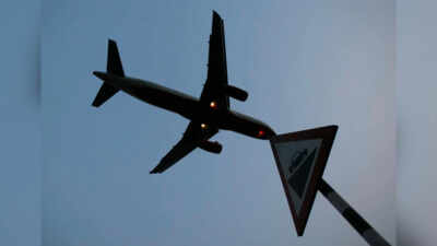 File photo: A plane prepares to land at an airport in New Delhi India mulls annual dope tests on all commercial pilots on a random basis