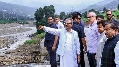 Jammu: Jammu and Kashmir Chief Minister Omar Abdullah inspects the flood affected areas to assess the damage caused, in Rajouri. (PTI Photo) J&K CM visits flood-hit Rajouri, reviews relief measures