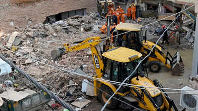 The multi-storey building collapsed at around 1.30 pm on Sunday Delhi building collapse: 5 MCD officials suspended, death toll rises to 7 - key points
